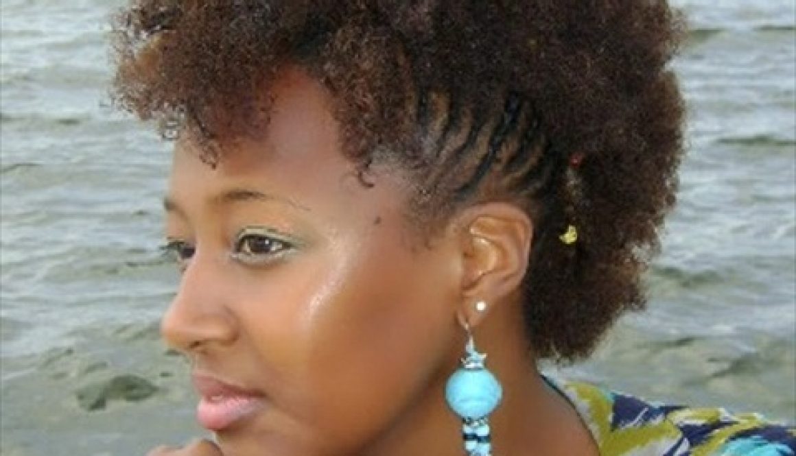 African American woman with natural hairstyle in Fro-hawk